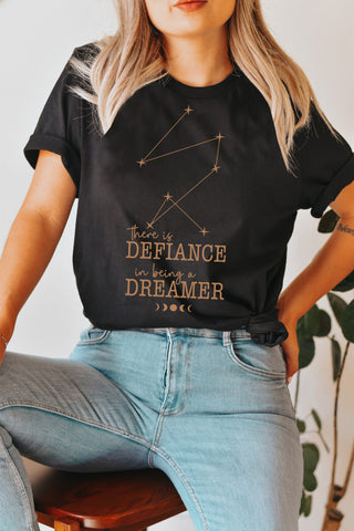 Defiance in being a dreamer T-Shirt | Addie La Rue Defiance in being a dreamer T-Shirt | Addie La Rue