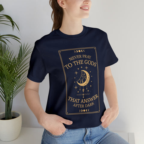 Never pray to the Gods that answer after dark t-shirt | Addie La Rue