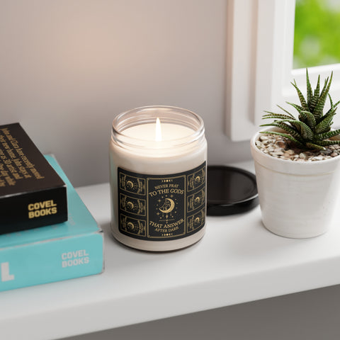 Never pray to the gods that answer after dark 9z Scented Candle | Addie La Rue