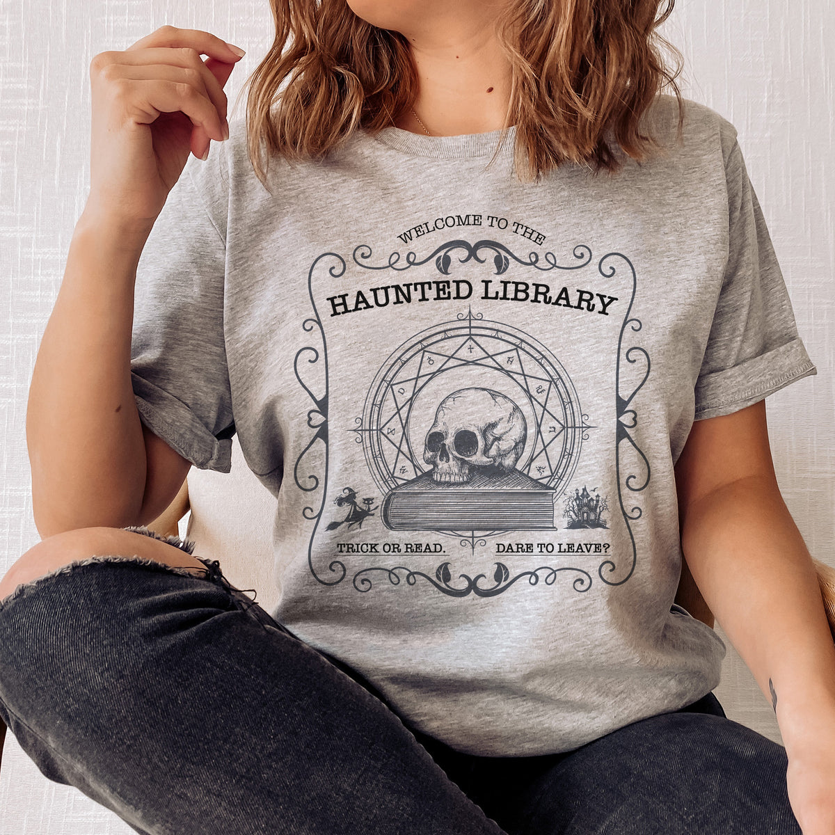 Welcome to the Haunted Library t-shirt | Bookish